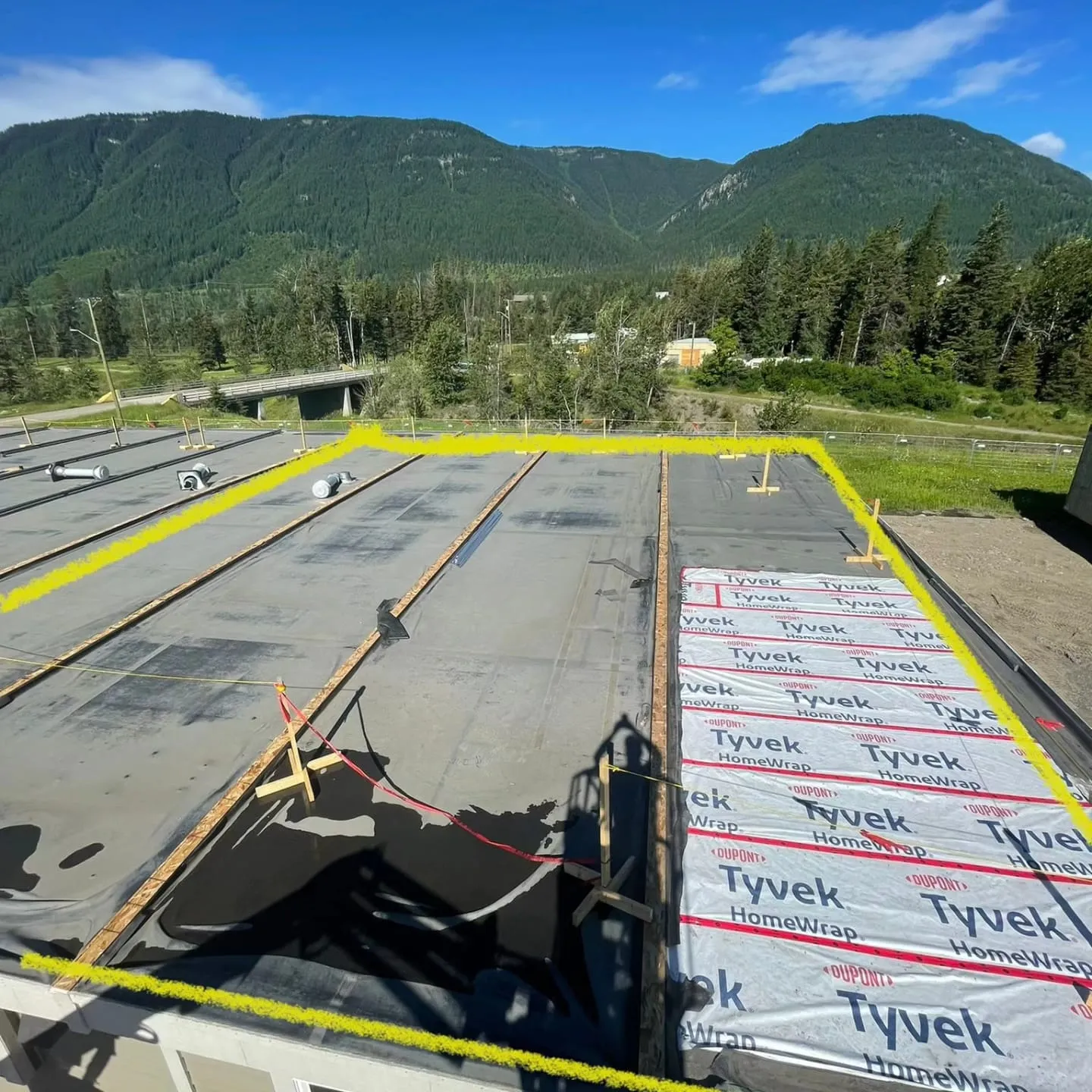 Flat roof membrane going down on a Calgary building