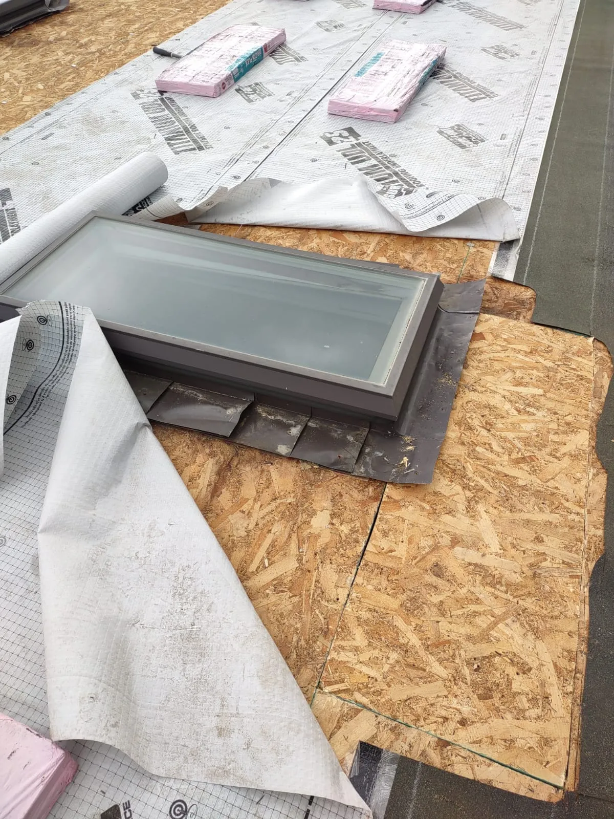Tarp covering an open roof section during an emergency call